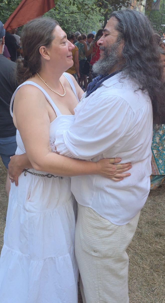 Holding each other at dusk